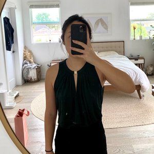 Dark green sleeveless blouse